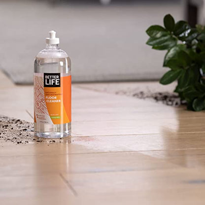 Clean happens floor cleaner bottle on the floor.