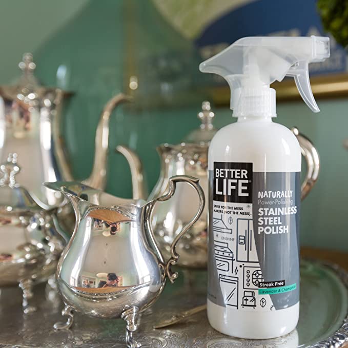 Clean Happens Stainless Steel Polish with steel utensils.