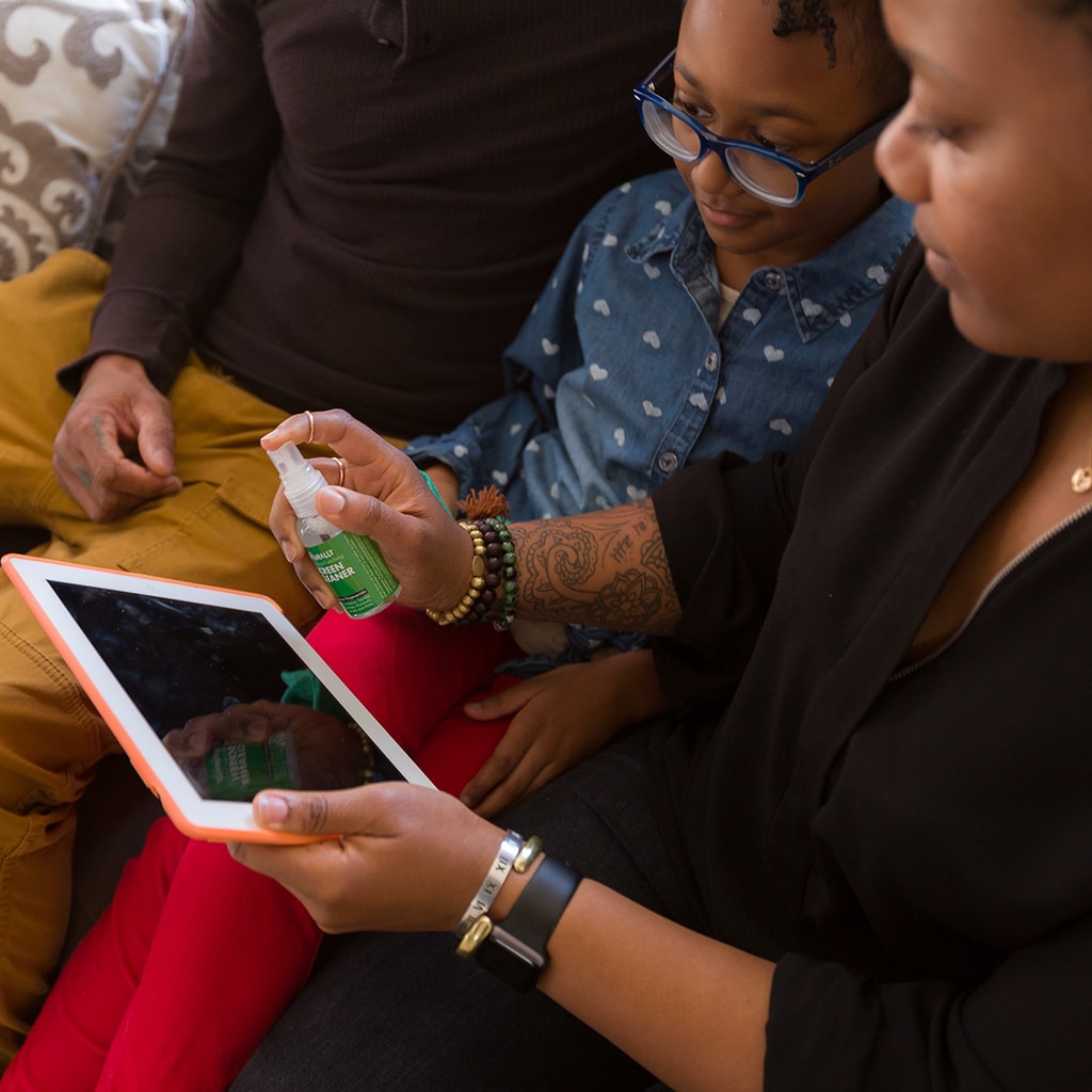 Family using a 2oz bottle of screen cleaner